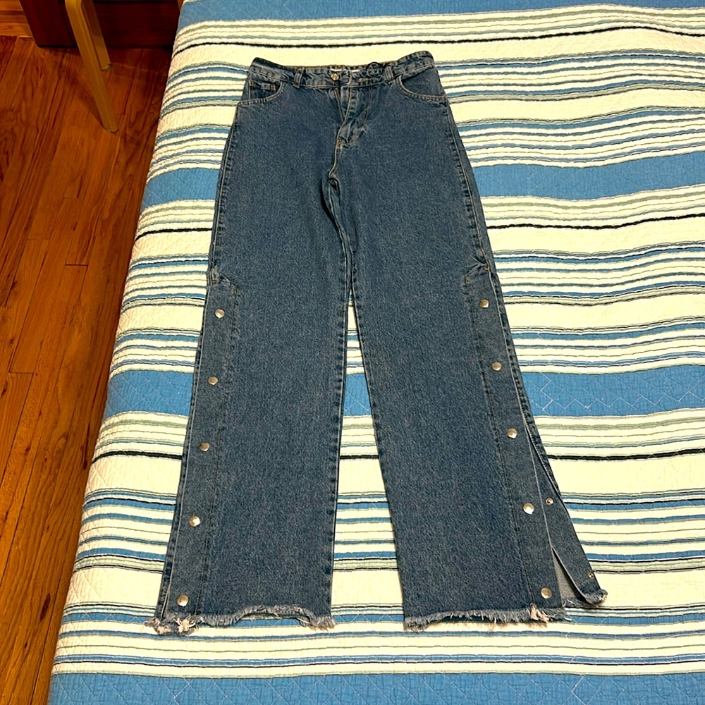 Blue jeans with snap buttons. European brand. Size 28 (European)